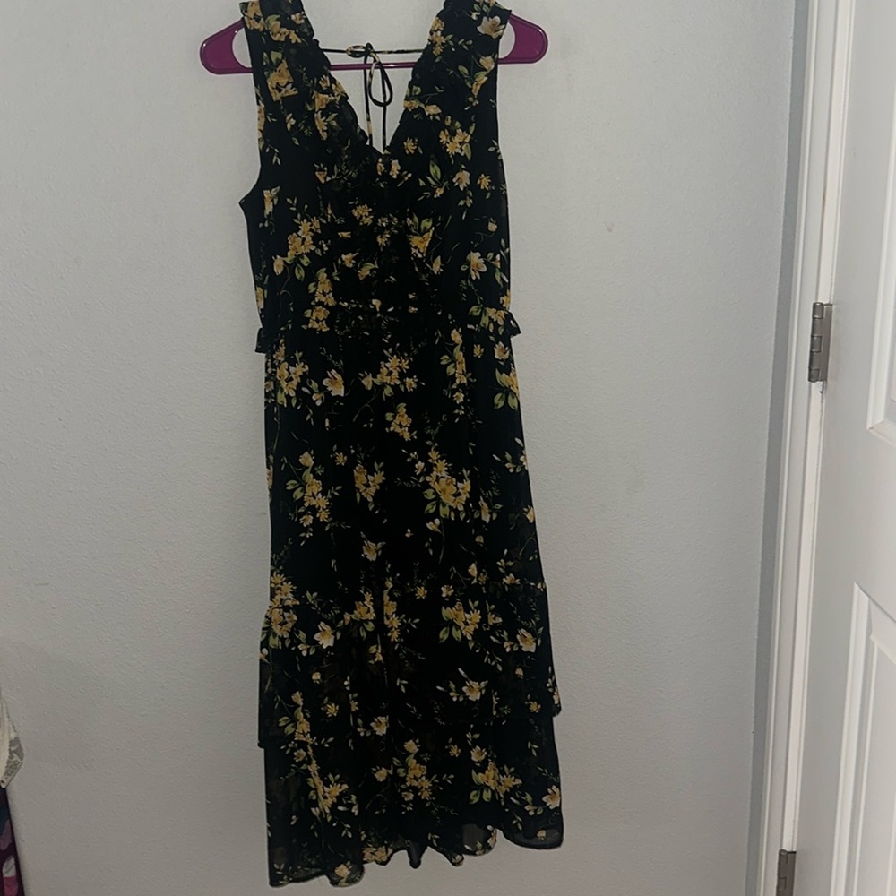 Black dress with yellow floral pattern v-neck front and back bow on back of neck